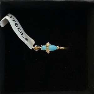 Charmed Aroma gold and turquoise ring.